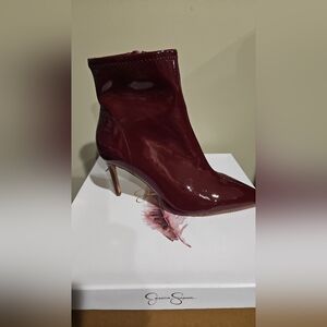 32.    Jessica Simpson Glossy Maroon Heeled Boots